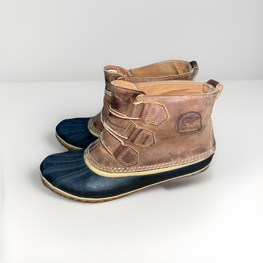Sorel Tan and Dark Blue Winter Boots